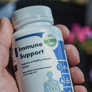 Immune Support Bottle in Hand